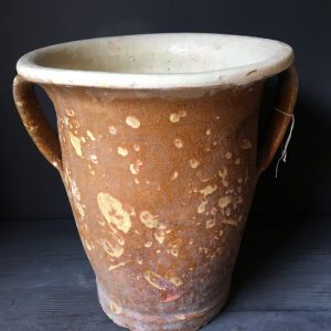 Italian 19th century pot with a cream inner glaze and slip wear outer