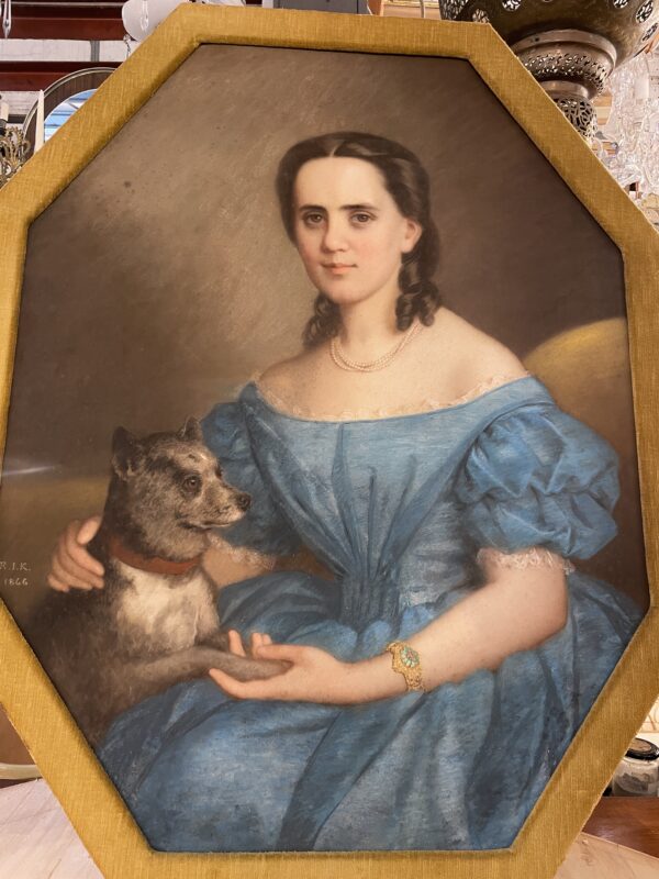 19th century Pastel portrait 0f a lady in blue dress, with a dog, in a Hexagonal frame. Signed R.I.K (1866)