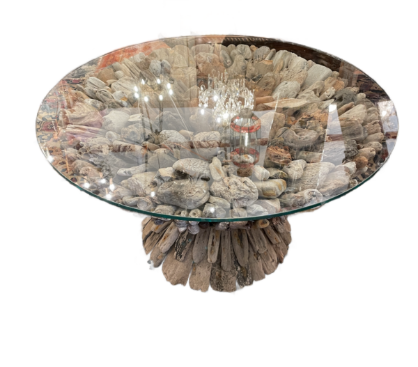 Bespoke driftwood table with glass top.