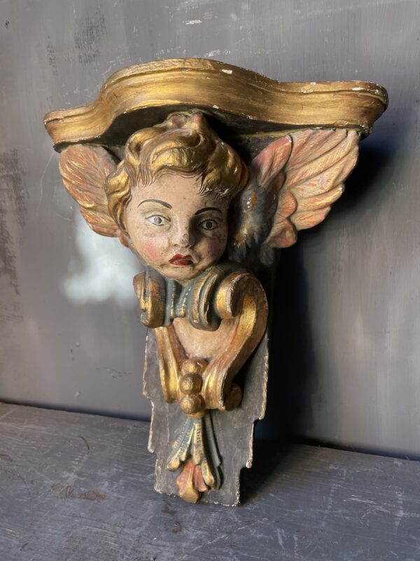 Painted 19th century angel console.