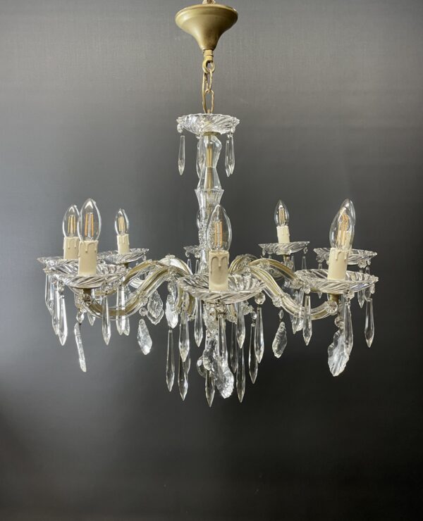 Crystal glass chandelier with 8 lights.