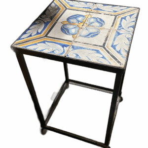 Antique tiles set in a metal table base.(BNP)