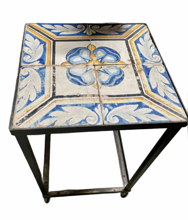 Antique tiles set in a metal table base.(BNP) - Image 3