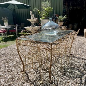 Italian garden set with 6 chairs and a glass top. 152cm (60") long x 76cm (30")wide x 75cm (29.5") high (BRHP)