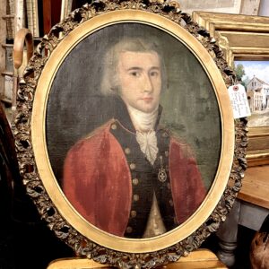 Oval portrait in oil of a Georgian gentleman in a red coat. (circa 1740)(BRHP)
