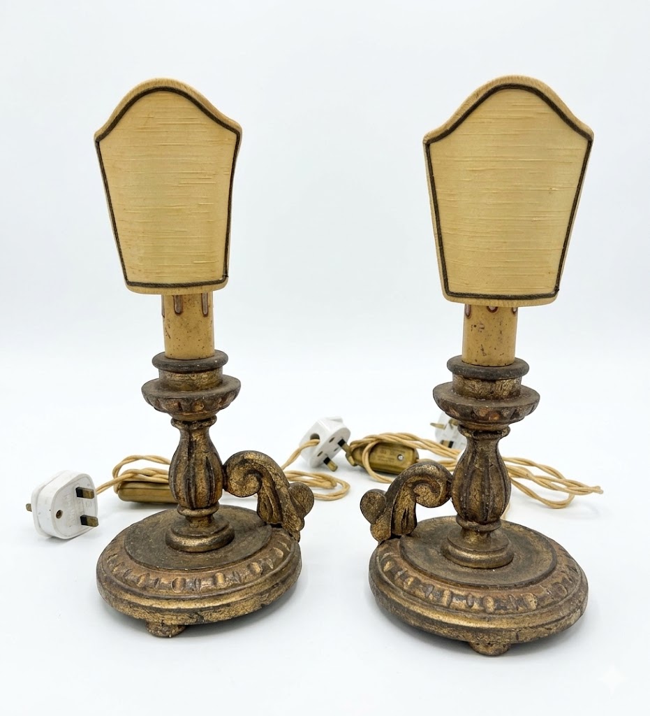A pair of silvered Italian wood candle lamps. (RHP each)