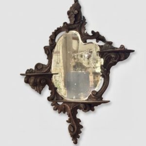 19th century carved wood console with a bevelled glass and cut/drop wheel motif.